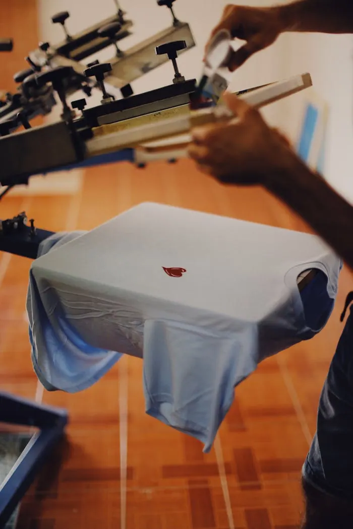 Siebdruck Maschine in Produktion bei Textildruck Wien