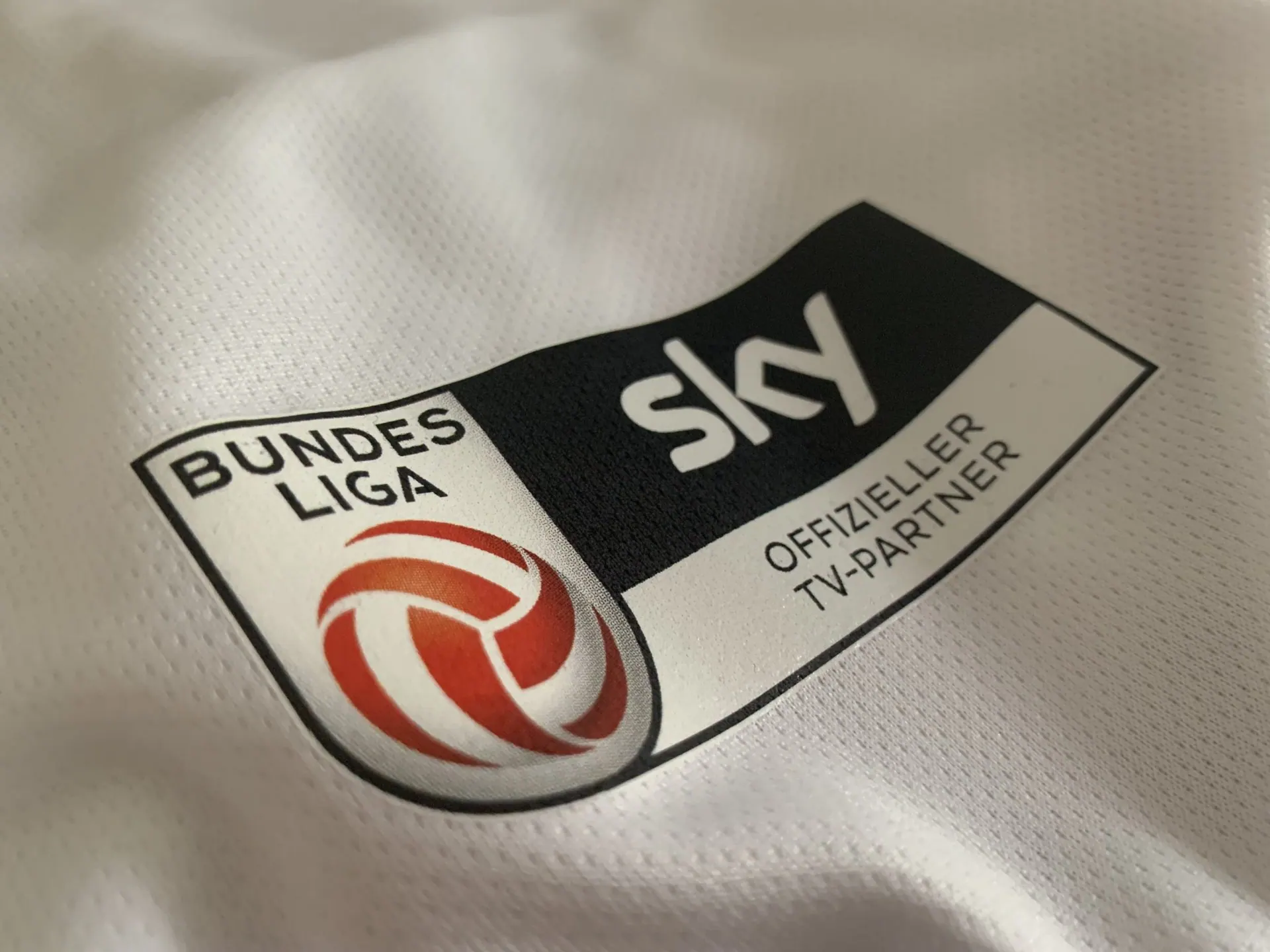 Sportgewand mit Logo bedruckt